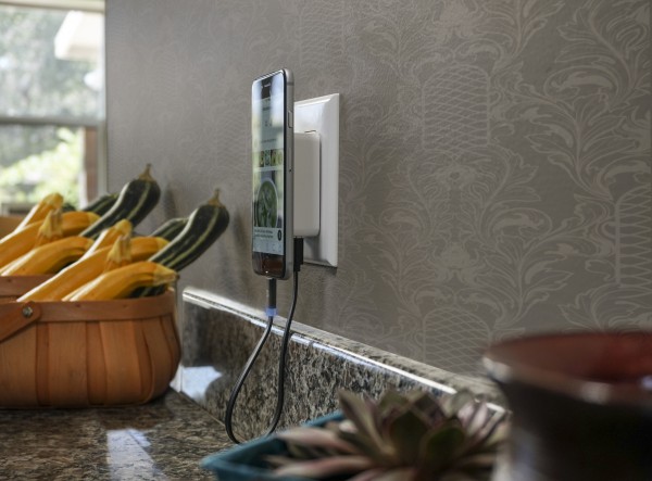 SCOSCHE's New MagicMount Wall Charger secures your phone off the tables with it's High-Powered Neodymium Magnet System.